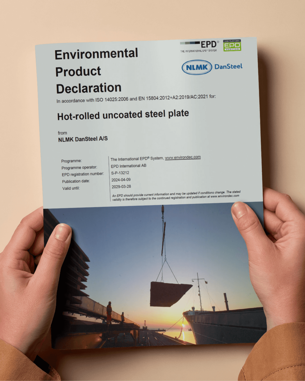Hands holding the NLMK DanSteel Environmental Product Declaration